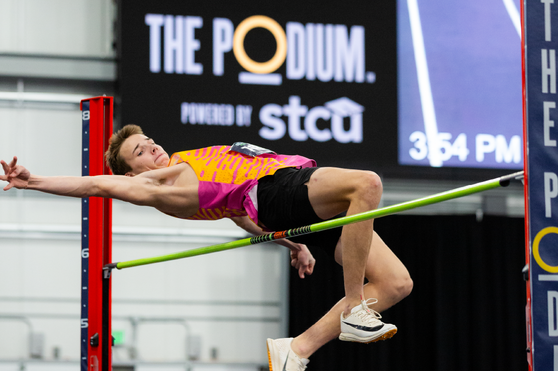Photo of a young man doing the high jump
